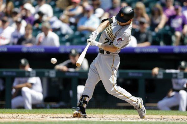 Aug. 8, 2018; Denver, CO; Pittsburgh Pirates second baseman Adam Frazier hits a double in the third inning against the Colorado Rockies. (Isaiah J. Downing—USA TODAY Sports)