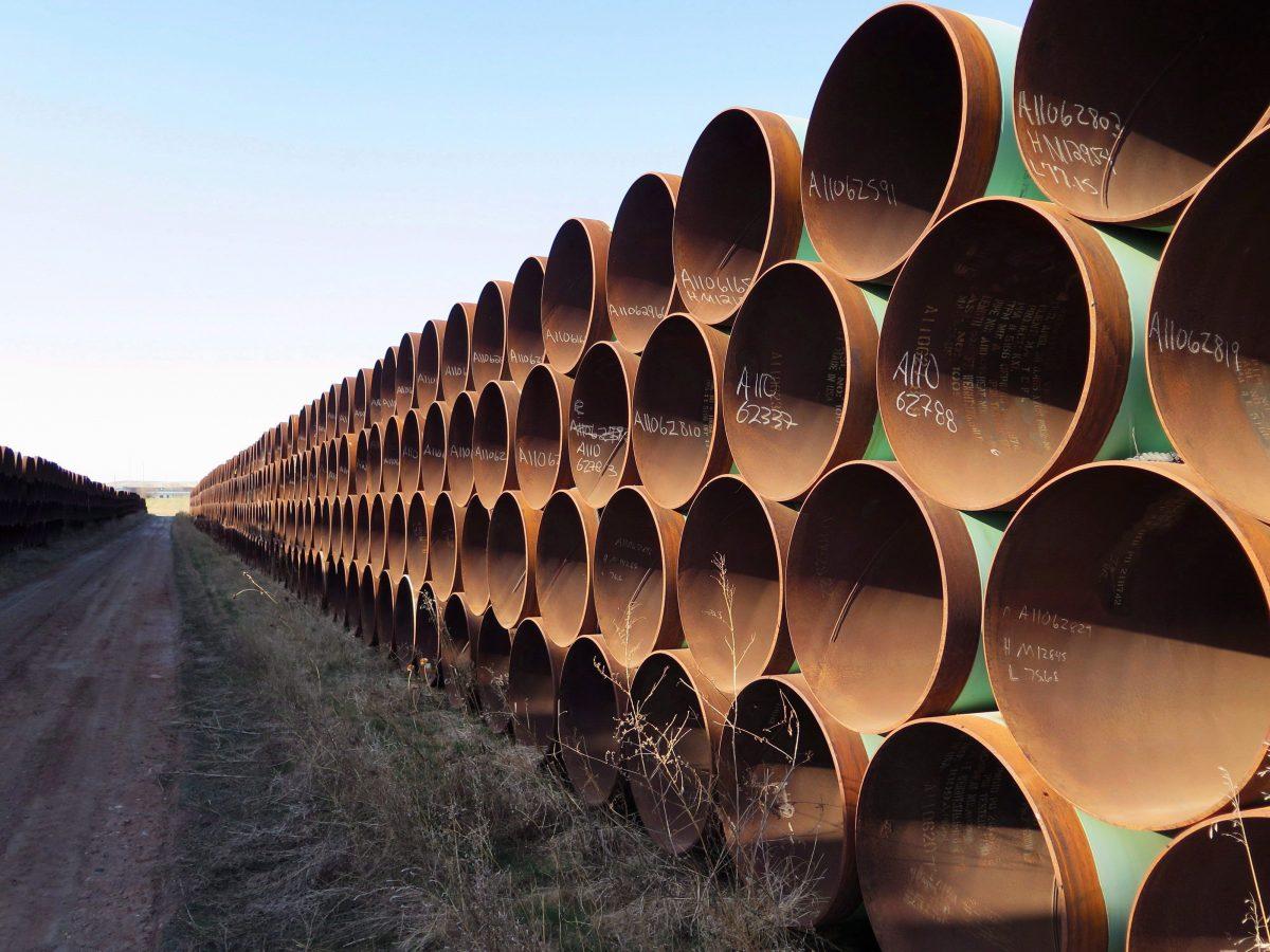 Pipes destined for the Keystone XL pipeline are stacked in Gascoyne, North Dakota, April 22, 2015. (The Canadian Press/Alex Panetta)
