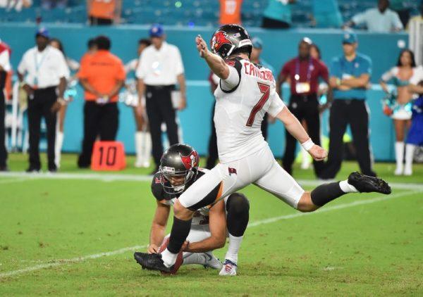 Aug. 9, 2018; Miami Gardens, Fla; Tampa Bay Buccaneers kicker Chandler Catanzaro kicks the game winning field goal during the second half against the Miami Dolphins. (Jasen Vinlove—USA TODAY Sports)