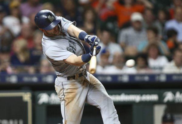 Aug. 9, 2018; Houston, Texas; Seattle Mariners Mitch Haniger hits an RBI single during the sixth inning against the Houston Astros. (Troy Taormina—USA TODAY Sports)