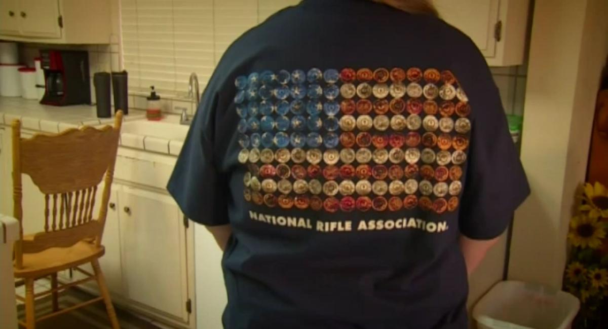 The back of the 15-year-old's shirt that depicts the American flag made up of shell casings and the words "National Rifle Association," Aug. 8, 2018. (FOX10)