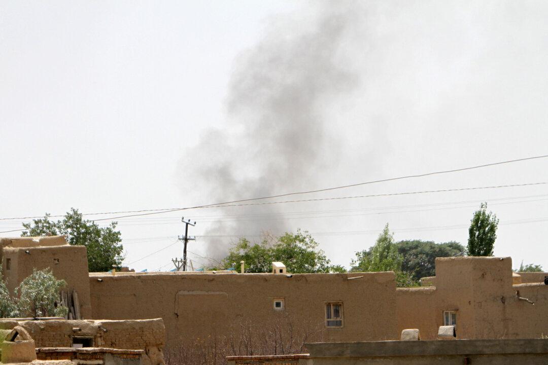 Clashes Continue as Taliban Press Afghan City South of Kabul