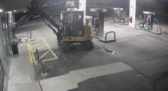 A man trying to use a stolen excavator to wrest an ATM from a Sinclair gas station in Cheyenne, Wyoming on August 4, 2018. (Cheyenne Police Department)