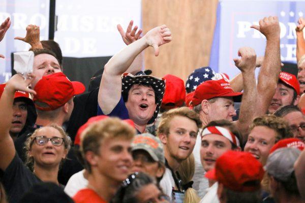 Audience members boo the media at a Make America Great Again rally in Lewis Center, Ohio, on Aug. 4, 2018. (Charlotte Cuthbertson/The Epoch Times)