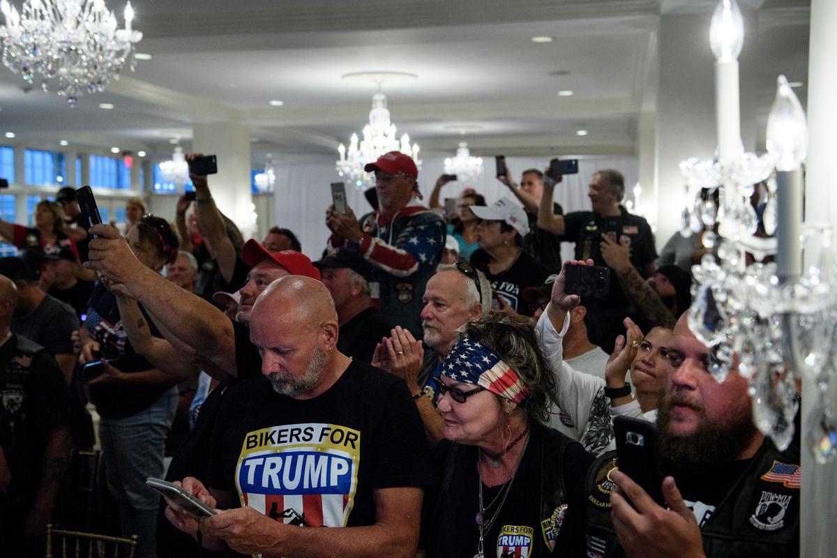 Supporters focus on US President Donald Trump during a "Bikers for Trump" event at the Trump National Golf Club on Aug. 11, 2018, in Bedminster, New Jersey. (BRENDAN SMIALOWSKI/AFP/Getty Images)