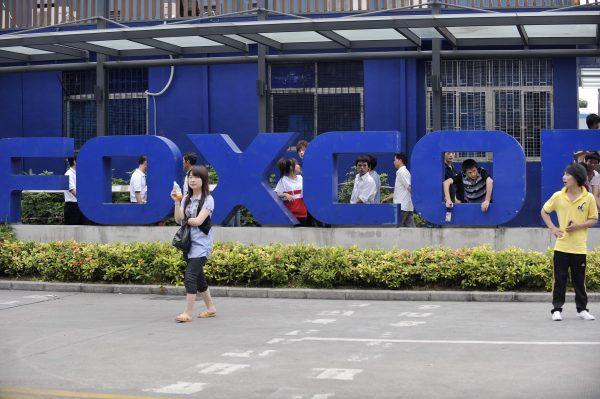 Chinese workers outside the Foxconn factory in Shenzhen City, Guangdong Province, China, on May 27, 2010. (STR/AFP/Getty Images)