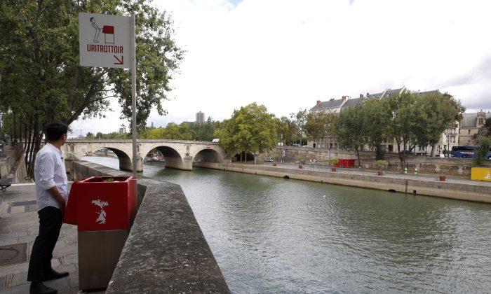 Residents of Paris Neighborhoods Voice Outrage Over Very Public Eco-Friendly Urinals