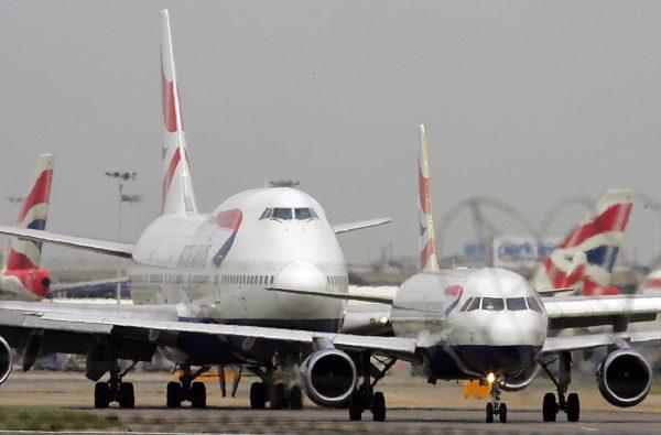 Planes get ready for take off at London's Heathrow Airport. (Odd Anderson/AFP/Getty Images)