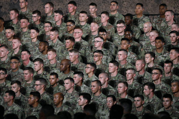 Soldiers from the 10th Mountain Division listen to Vice President Mike Pence at the Wheeler-Sack Army Airfield in Fort Drum, N.Y., on Aug. 13, 2018. (Charlotte Cuthbertson/The Epoch Times)