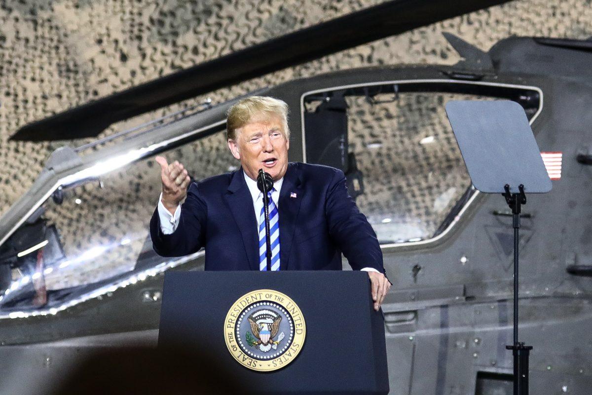 President Donald Trump speaks at Wheeler-Sack Army Airfield before signing the 2019 National Defense Authorization Act, at Fort Drum, N.Y., on Aug. 13, 2018. (Charlotte Cuthbertson/The Epoch Times)