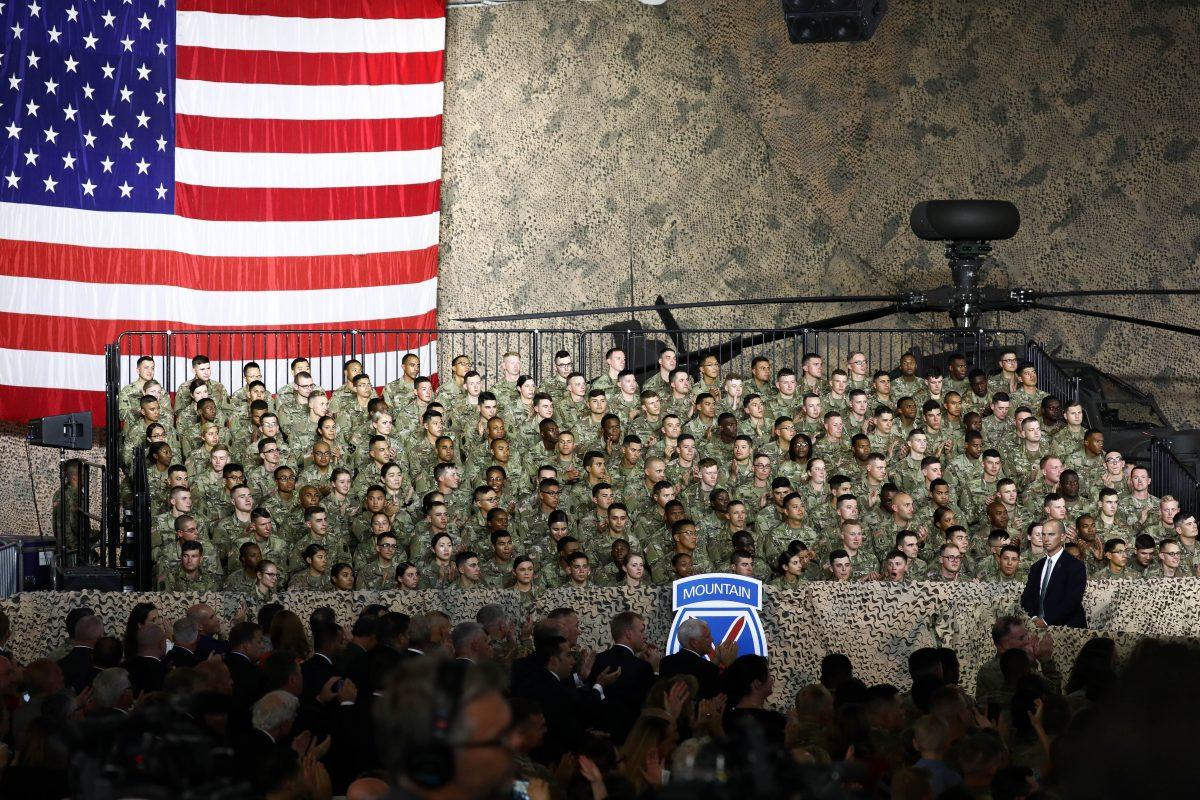 Soldiers from the 10th Mountain Division listen to Vice President Mike Pence at Wheeler-Sack Army Airfield at Fort Drum, N.Y., on Aug. 13, 2018. (Charlotte Cuthbertson/The Epoch Times)