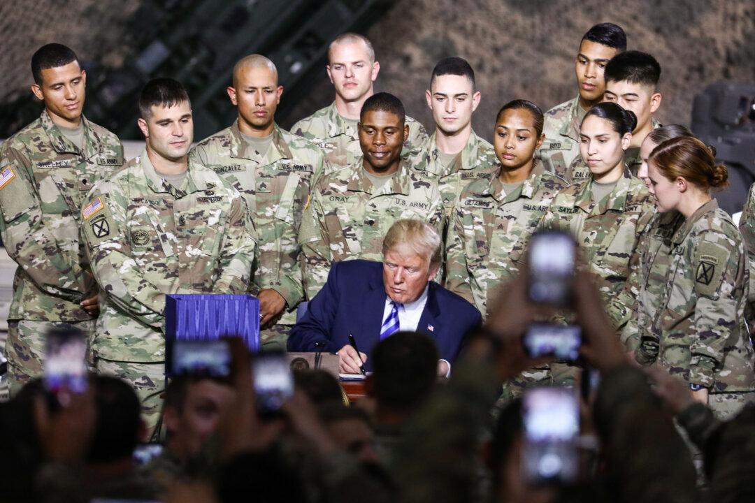 In Photos: Trump Signs 2019 National Defense Authorization Act