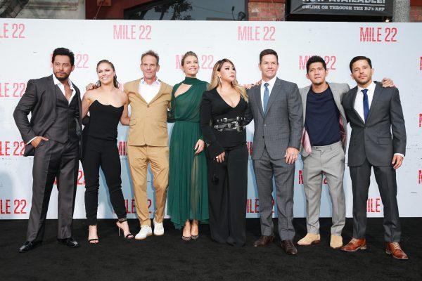 Sam Medina, Ronda Rousey, Peter Berg, Lauren Cohan, CL, Mark Wahlberg, Iko Uwais and Carlo Alban attend the premiere of "Mile 22" at Westwood Village Theatre on Aug. 9, 2018.(Rich Fury/Getty Images)