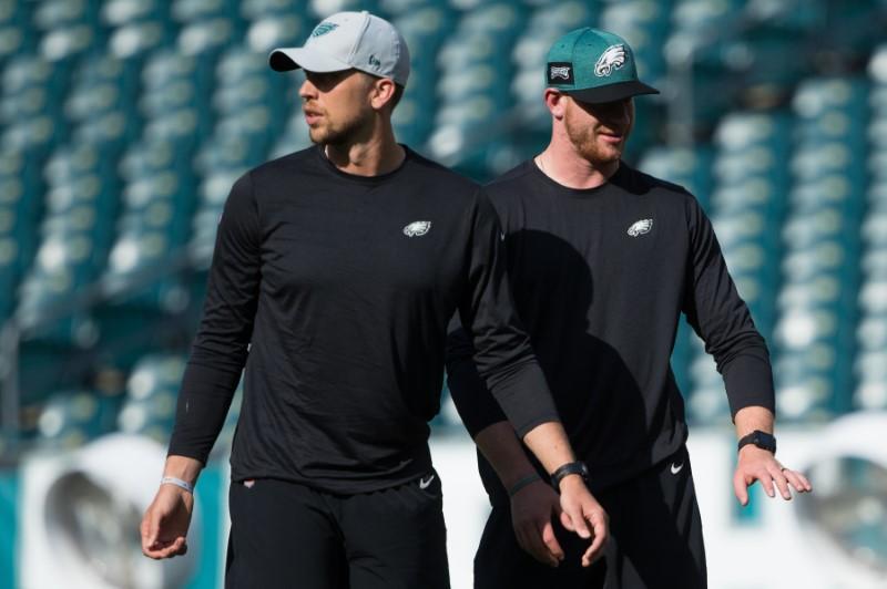 Philadelphia Eagles quarterback Carson Wentz (R) and quarterback Nick Foles (L) before a game against the Pittsburgh Steelers at Lincoln Financial Field on Aug. 9, 2018 (Bill Streicher/USA Today Sports)