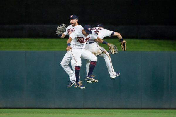 Minnesota Twins outfielder Jake Cave, outfielder Eddie Rosario and outfielder Max Kepler celebrate after the game against Pittsburgh Pirates. (Brad Rempel/USA Today Sports)