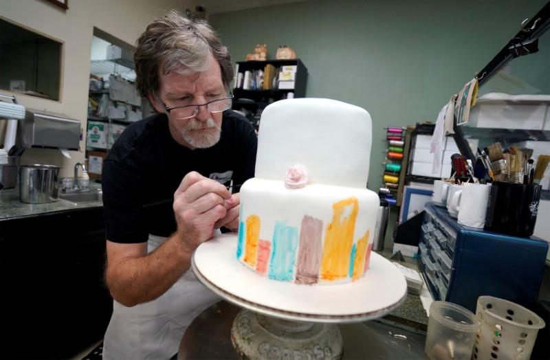 Baker Jack Phillips decorates a cake in his Masterpiece Cakeshop in Lakewood, Colorado, on Sep. 21, 2017. (Rick Wilking/Reuters)