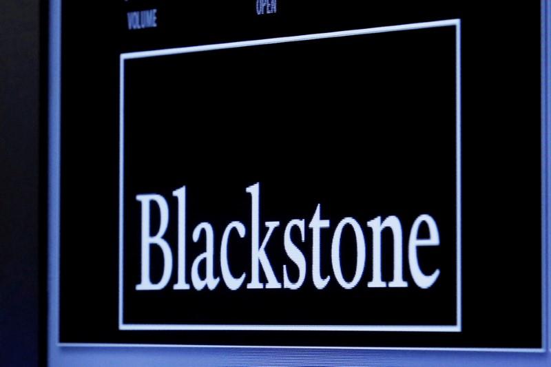 The logo of Blackstone Group is displayed at the post where it is traded on the floor of the New York Stock Exchange on April 4, 2016. (Reuters/Brendan McDermid)