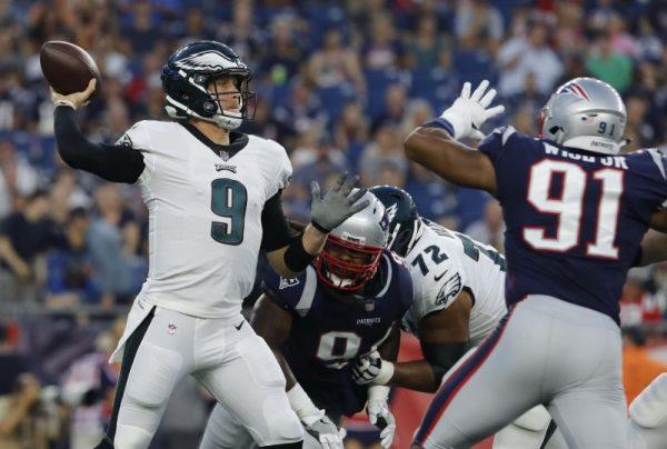 Philadelphia Eagles quarterback Nick Foles throws a pass against the New England Patriots in the first quarter. (David Butler II/USA Today Sports)