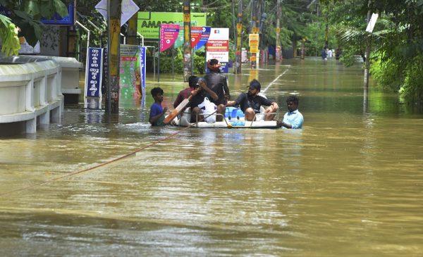 Rescuers used helicopters and boats on Aug. 17, 2018, to evacuate thousands of people stranded on their rooftops following unprecedented flooding in the southern Indian state of Kerala that left more than 100 dead. (AP Photo)