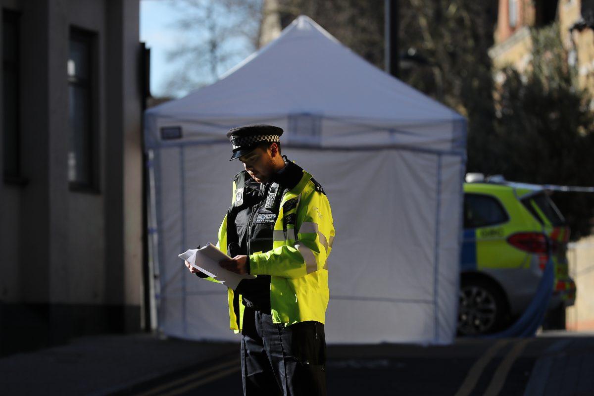 A forensic tent covers the scene of a knife crime in London, on April 5, 2018. (Christopher Furlong/Getty Images)