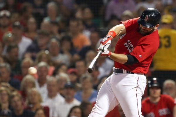 Boston Red Sox first baseman Mitch Moreland hits an RBI single to put the Boston Red Sox in the lead against the Tampa Bay Rays. (Paul Rutherford/USA Today Sports)