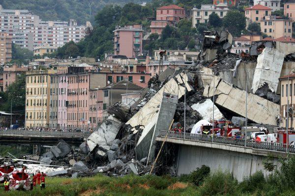 The collapsed Morandi Bridge is seen in the Italian port city of Genoa, Italy August 14, 2018. (Reuters/Stefano Rellandini)