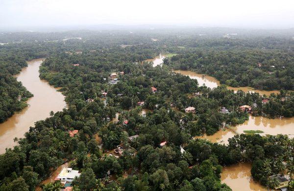 An aerial view shows partially submerged houses at a flooded area in the southern state of Kerala, India on August 17, 2018. (Sivaram V/REUTERS)
