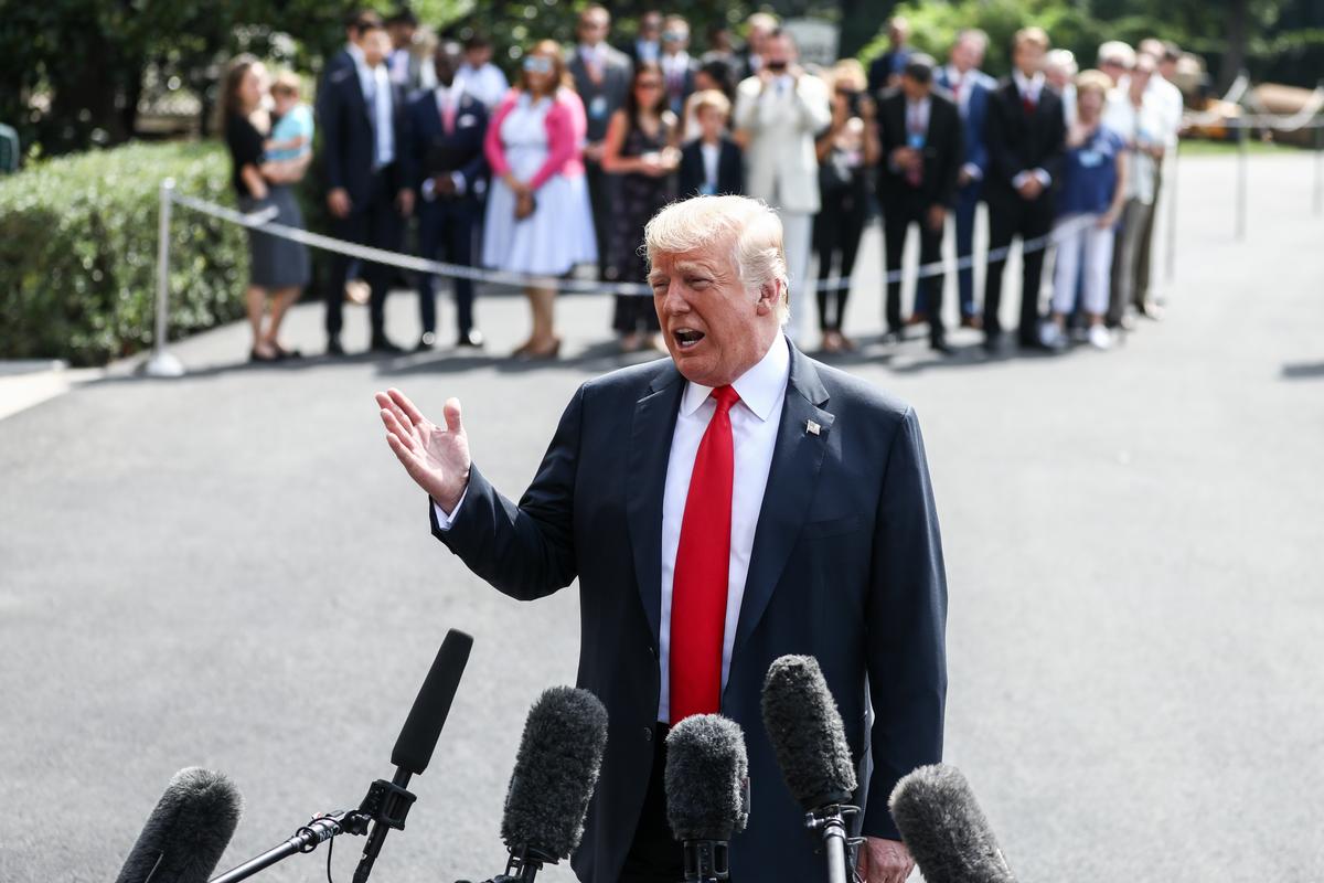 President Donald Trump talks to the media before leaving to Bedminster, N.J., at the White House in Washington on Aug. 17, 2018. (Samira Bouaou/The Epoch Times)