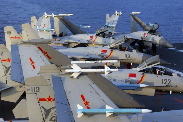 This undated photo taken in April 2018 shows J-15 multirole fighter jets on China's aircraft carrier, Liaoning, during a drill at sea. (AFP/Getty Images)