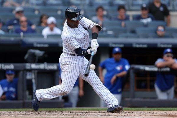 New York Yankees third baseman Miguel Andujar hits a two run double against the Toronto Blue Jays during the third inning. ( Brad Penner/USA Today Sports)