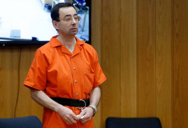 Larry Nassar, a former team USA Gymnastics doctor who pleaded guilty in November 2017 to sexual assault charges, stands in court during his sentencing hearing in the Eaton County Court in Charlotte, Michigan, on Feb. 5, 2018. (Reuters/Rebecca Cook)