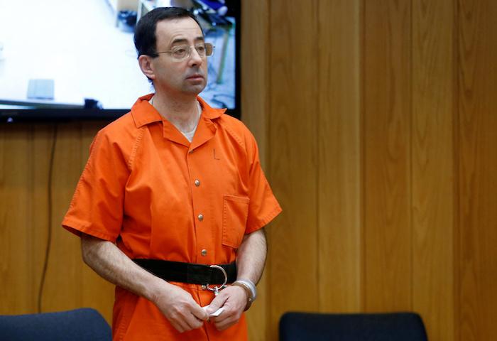 Larry Nassar, a former team USA Gymnastics doctor who pleaded guilty in November 2017 to sexual assault charges, stands in court during his sentencing hearing in the Eaton County Court in Charlotte, Mich., on Feb. 5, 2018. (Rebecca Cook/Reuters)