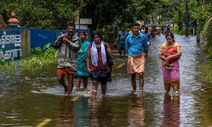 India Races to Avert Disease Outbreak as Flood Waters Recede