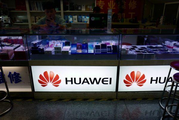 The Huawei logo at a store in Shanghai on May 3, 2018. (Johannes Eisele/AFP/Getty Images)