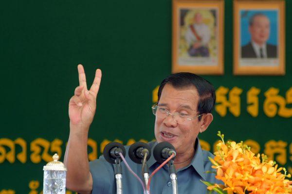 Cambodia's Prime Minister Hun Sen delivers his address before a huge gathering for garment workers in Phnom Penh on August 15, 2018. (AFP/Getty Images)