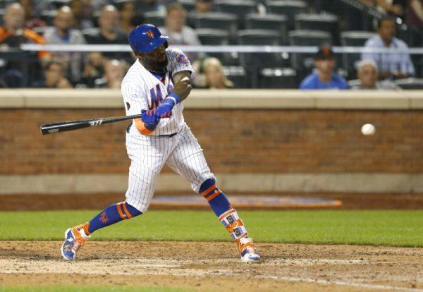 New York Mets shortstop Jose Reyes hits a triple in the eighth inning against San Francisco Giants. (Noah K. Murray/USA Today Sports)