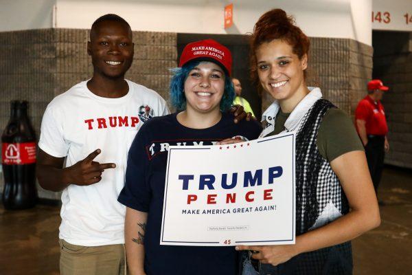 Kathrine Brown (R) with friends Phil Solis (L) and Kyra Parke-Davis (C) before a Make America Great Again rally in Charleston, W. Va., on Aug. 21, 2018. (Charlotte Cuthbertson/The Epoch Times)
