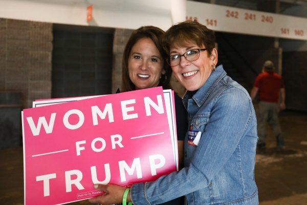 Bridget Furbee (R) and Heather McNally before a Make America Great Again rally in Charleston, W. Va., on Aug. 21, 2018. (Charlotte Cuthbertson/The Epoch Times)