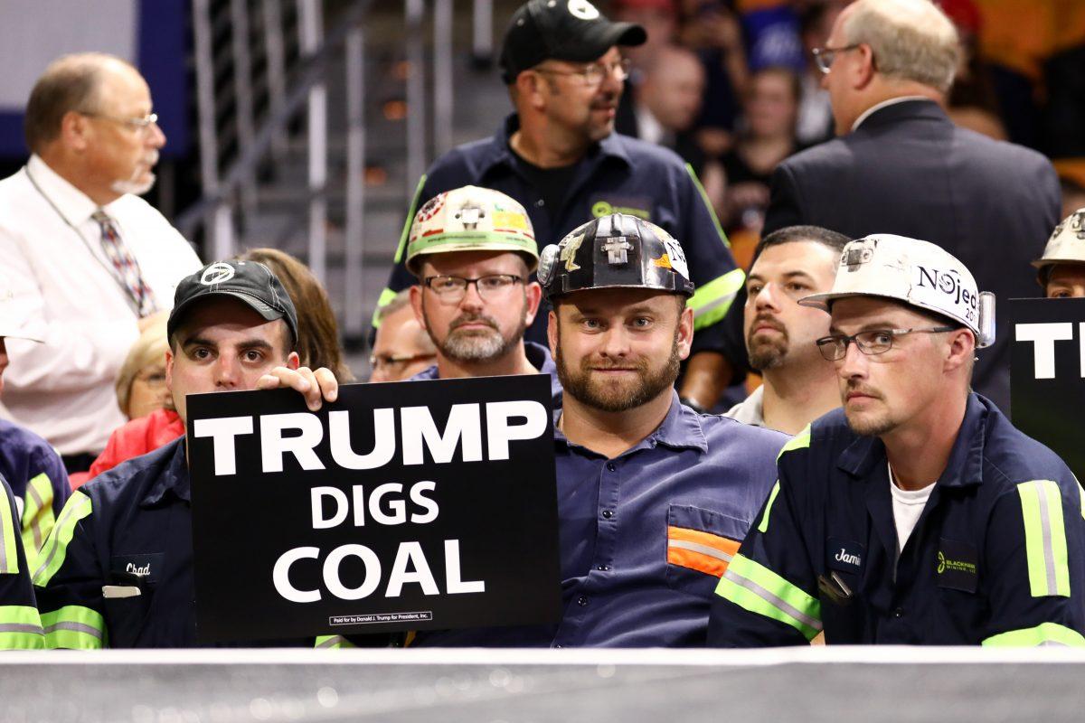 Coal miners at a Make America Great Again rally in Charleston, W. Va., on Aug. 21, 2018. (Charlotte Cuthbertson/The Epoch Times)