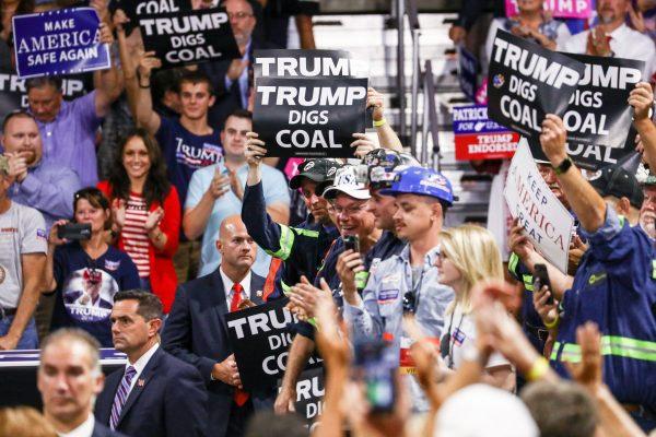 Coal miners were among the audience at a Make America Great Again rally in Charleston, W. Va., on Aug. 21, 2018. (Charlotte Cuthbertson/The Epoch Times)
