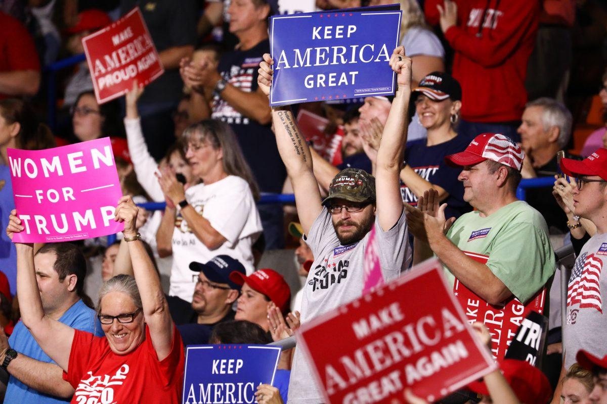 Audience members at a Make America Great Again rally in Charleston, W. Va., on Aug. 21, 2018. (Charlotte Cuthbertson/The Epoch Times)