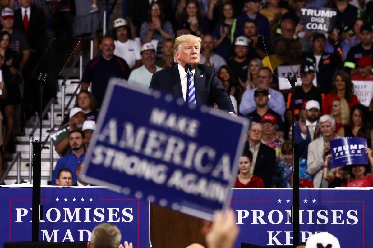President Donald Trump speaks at a Make America Great Again rally in Charleston, W. Va., on Aug. 21, 2018. (Charlotte Cuthbertson/The Epoch Times)