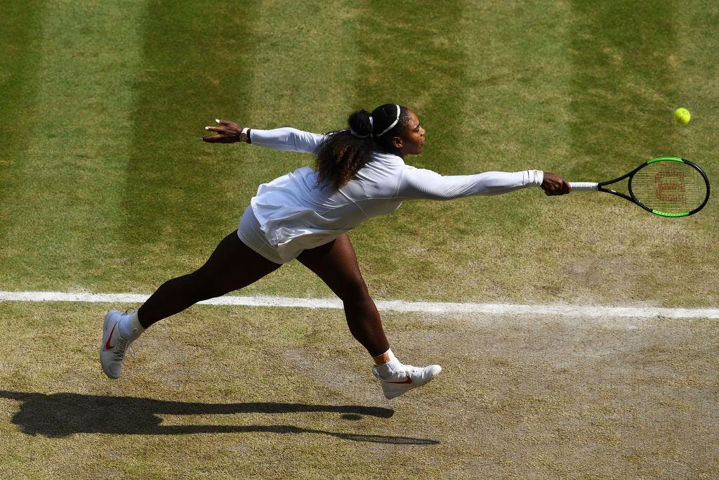 Serena Williams of plays a backhand against Julia Goerges of Germany during their Ladies' Singles semi-final match on day ten of the Wimbledon Lawn Tennis Championship on July 12, 2018 in London, England. (Clive Mason/Getty Images)
