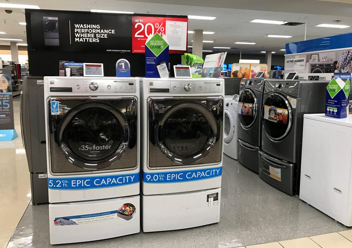 Sears Kenmore washing machines are shown for sale inside a Sears department store in La Jolla, Calif., on March 22, 2017. (Mike Blake/Reuters)