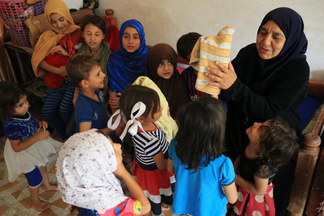 After ISIS Killed Her Sons, Iraqi Grandmother Fends for 22 Children