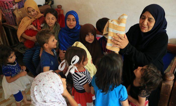 After ISIS Killed Her Sons, Iraqi Grandmother Fends for 22 Children