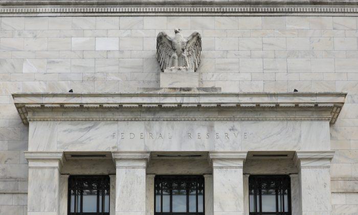 Fed Suggests Interest Rate Hike Could Come Soon
