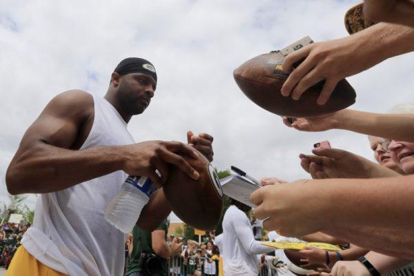 Green Bay Packers wide receiver Randall Cobb (18) signs autographs after training camp practice at Ray Nitschke Field. (Adam Wesley/USA Today Network-Wisconsin via USA Today Network)