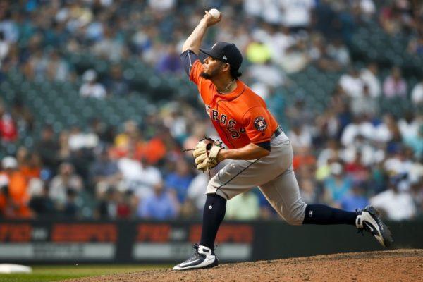 Houston Astros relief pitcher Roberto Osuna (54) throws against the Seattle Mariners during the ninth inning. (Joe Nicholson/USA Today Sports)