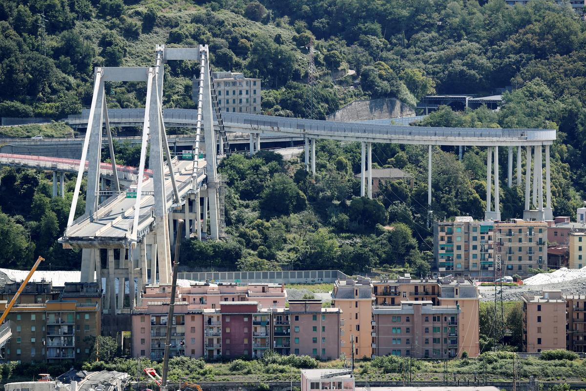The collapsed Morandi Bridge is seen in the port city of Genoa, Italy on Aug. 16, 2018. (Reuters/Stefano Rellandini)